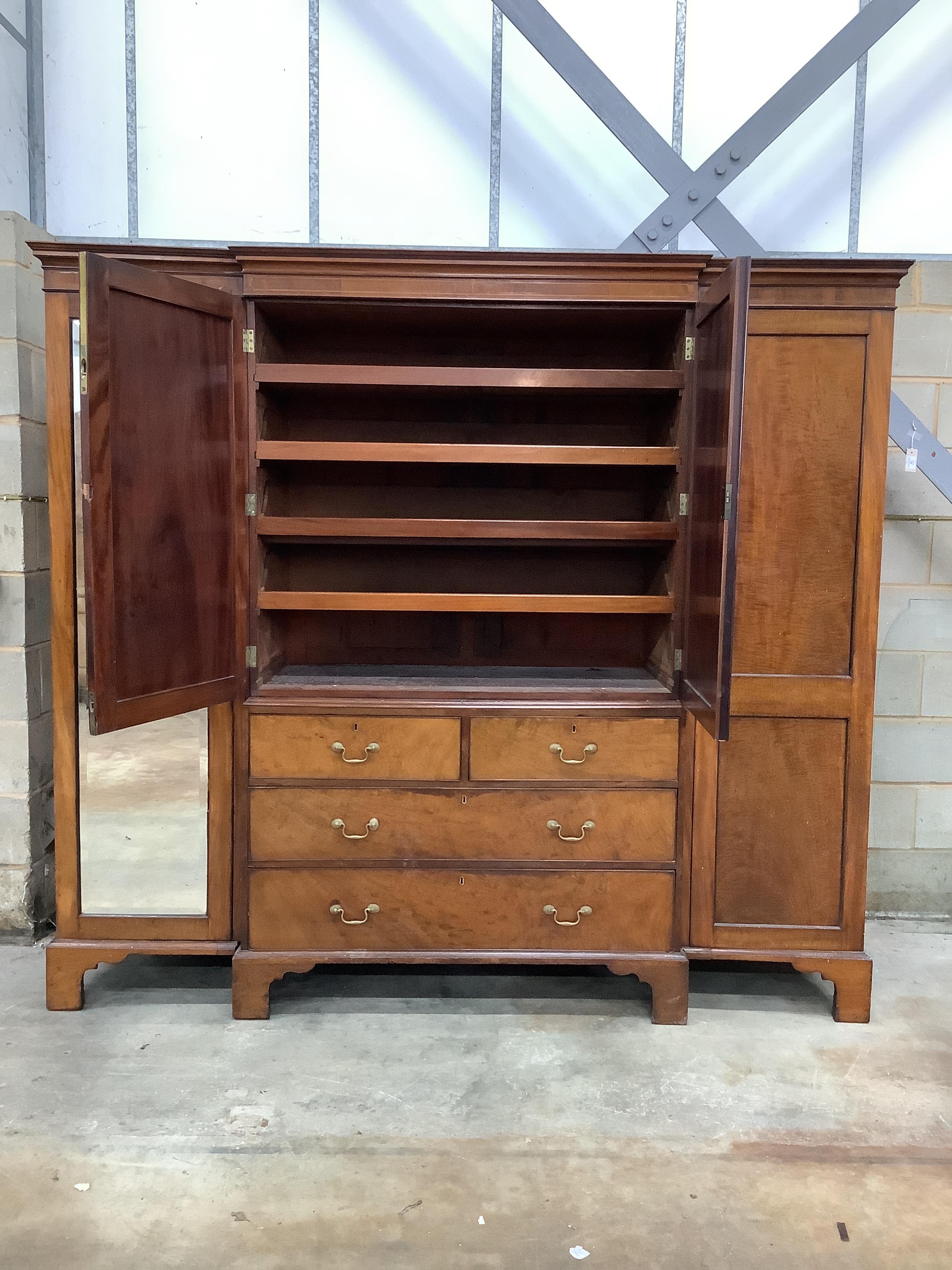 A 19th century and later mahogany breakfront wardrobe with linen press centre section, width 224cm, depth 60cm, height 207cm